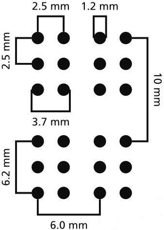 several braille cells with their legal measurements: 1,2 mm dot diameter, 2,5 mm between the center of the dots both vertically and horizontally, 6 mm between the centers of dots in the same position in 2 adjacent braille cells 